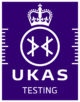 UKAS Testing logo featuring a crown above a circle with two interlocked “K” symbols inside, and the words UKAS TESTING below, all in white on a dark purple background.